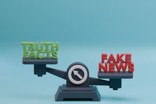 a scale with the words fake news on it
