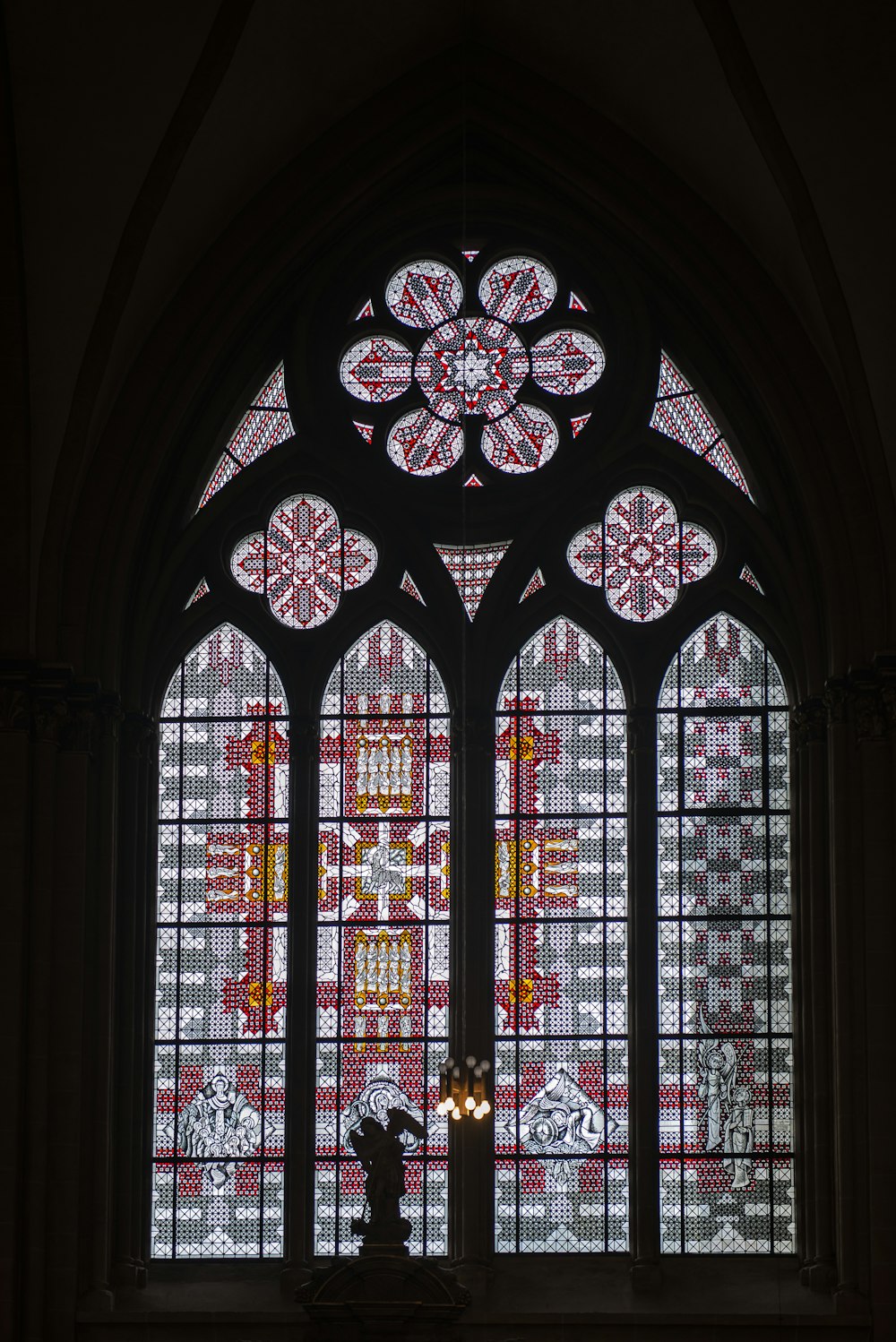 a large stained glass window in a church