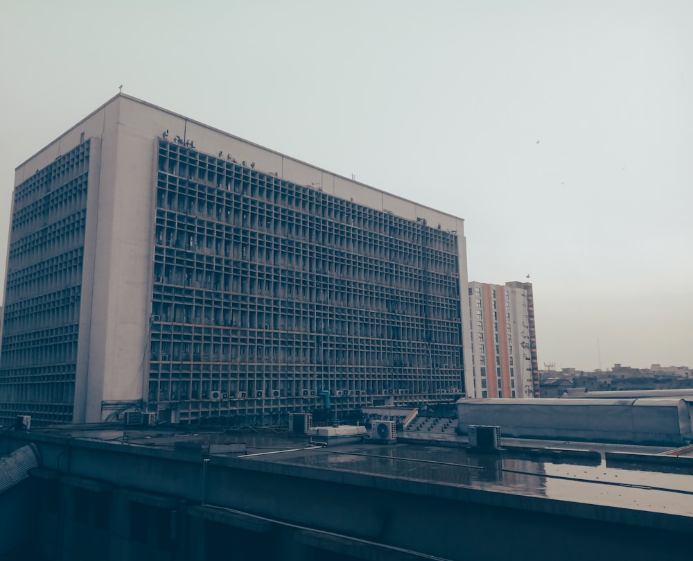 a very tall building sitting on top of a roof