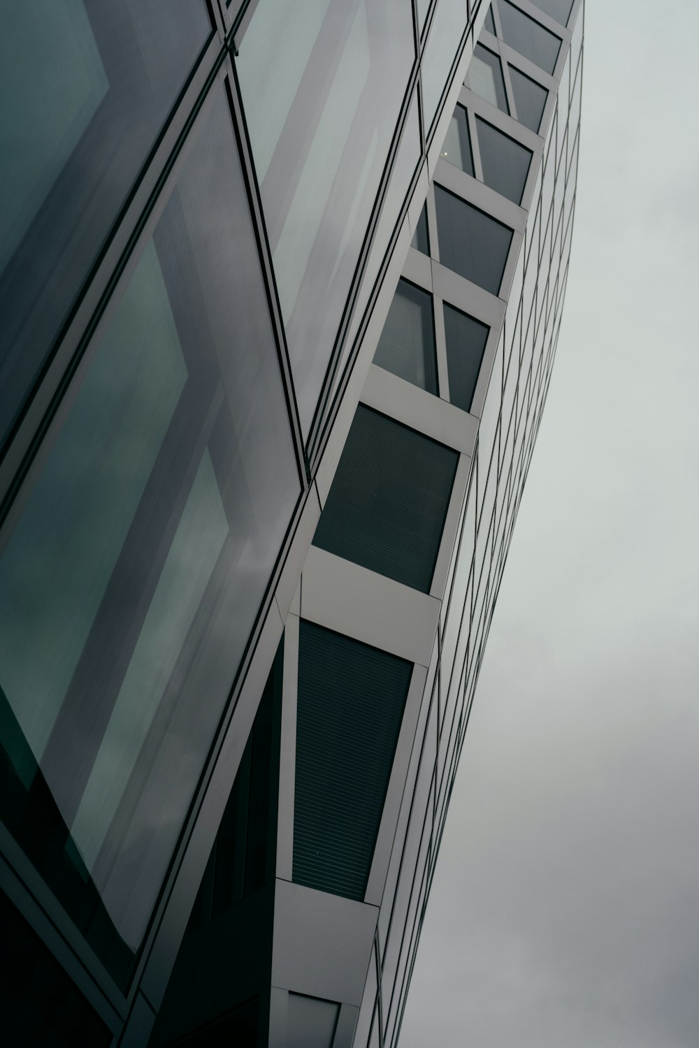 a very tall building with a sky in the background