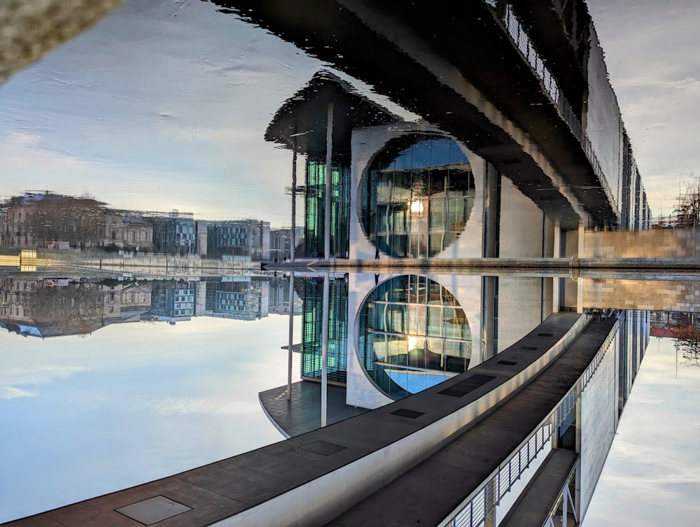 a reflection of a building in the water