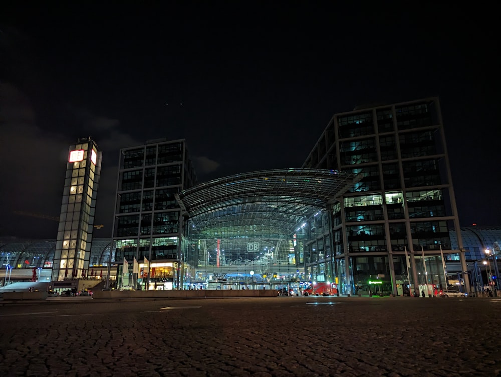 a large building with a lot of windows at night