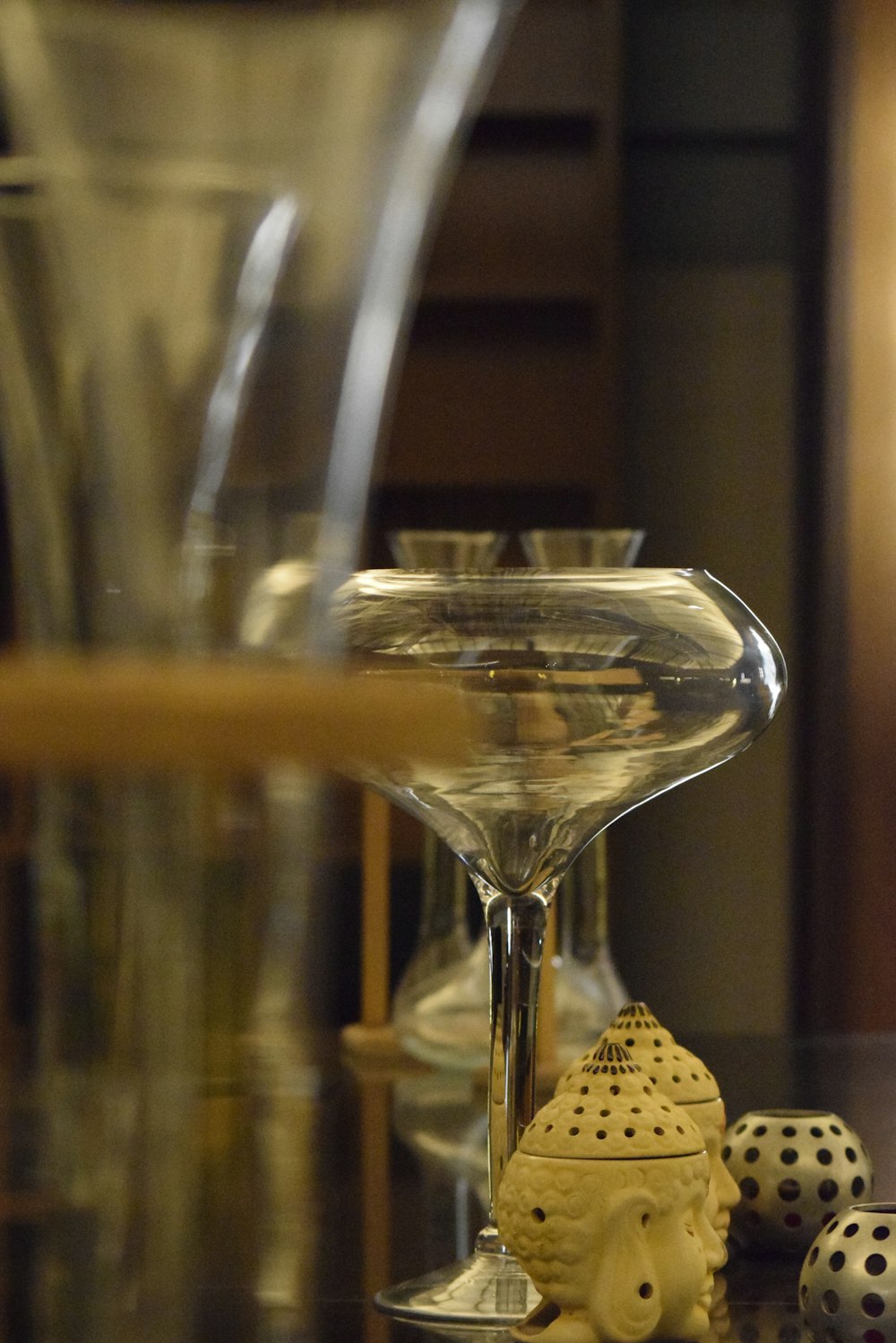 a close up of a wine glass on a table