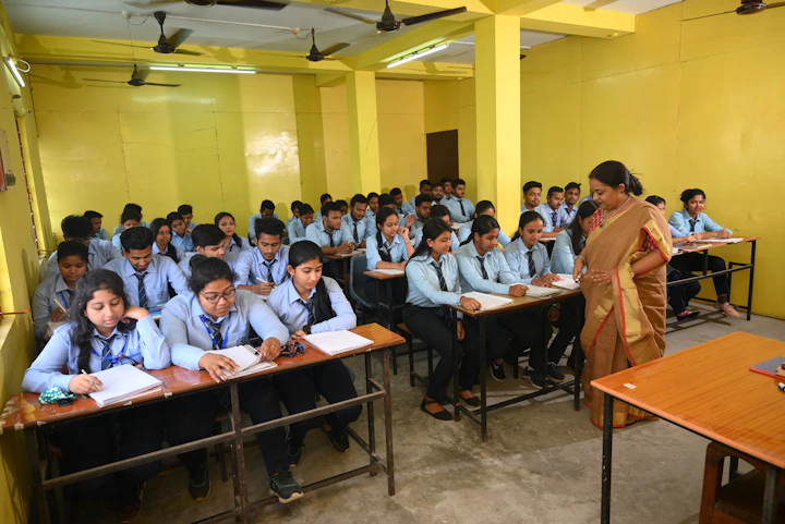 Students in a modern classroom at NewAge PU College Yelahanka