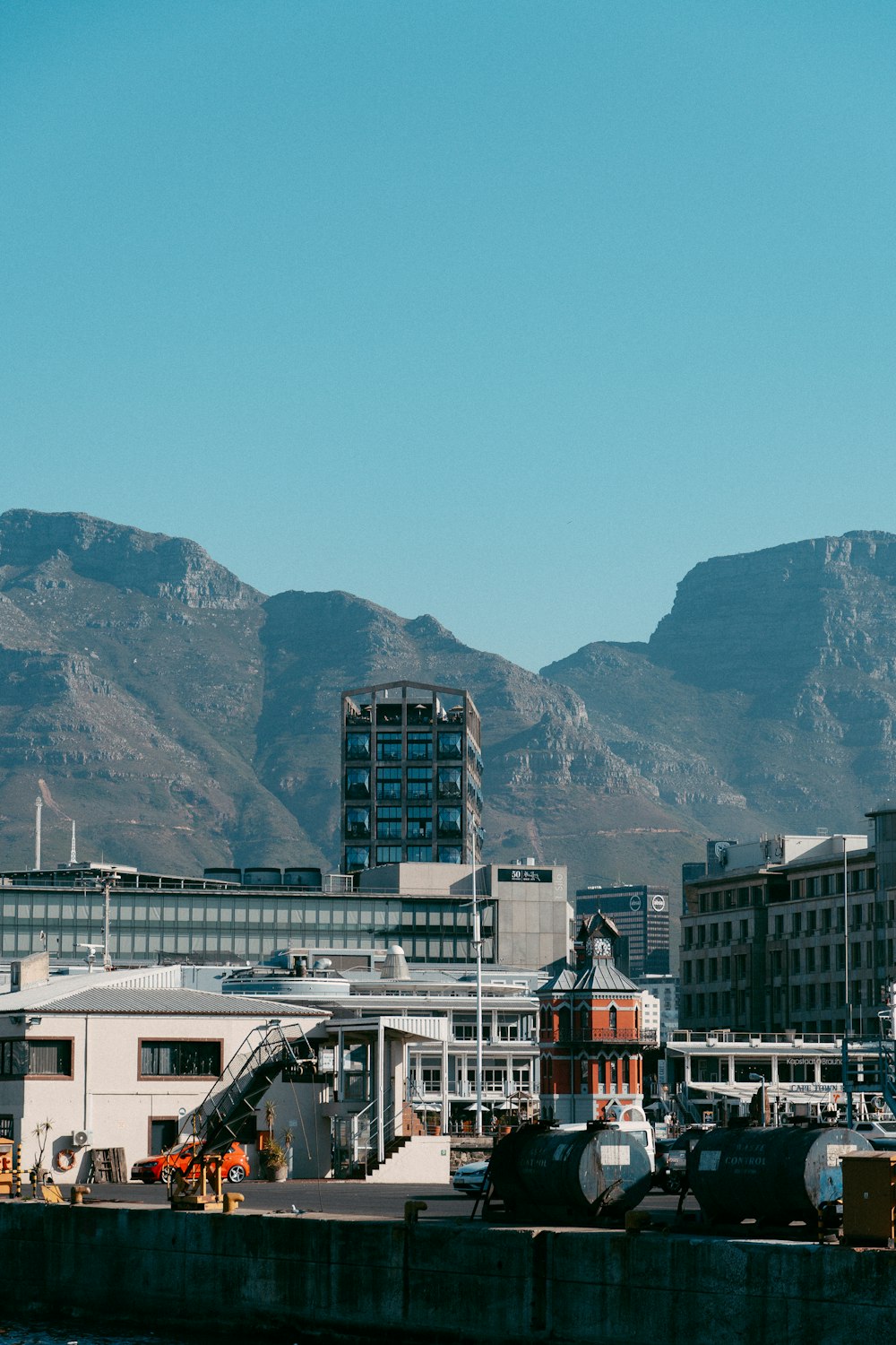 a city with mountains in the background