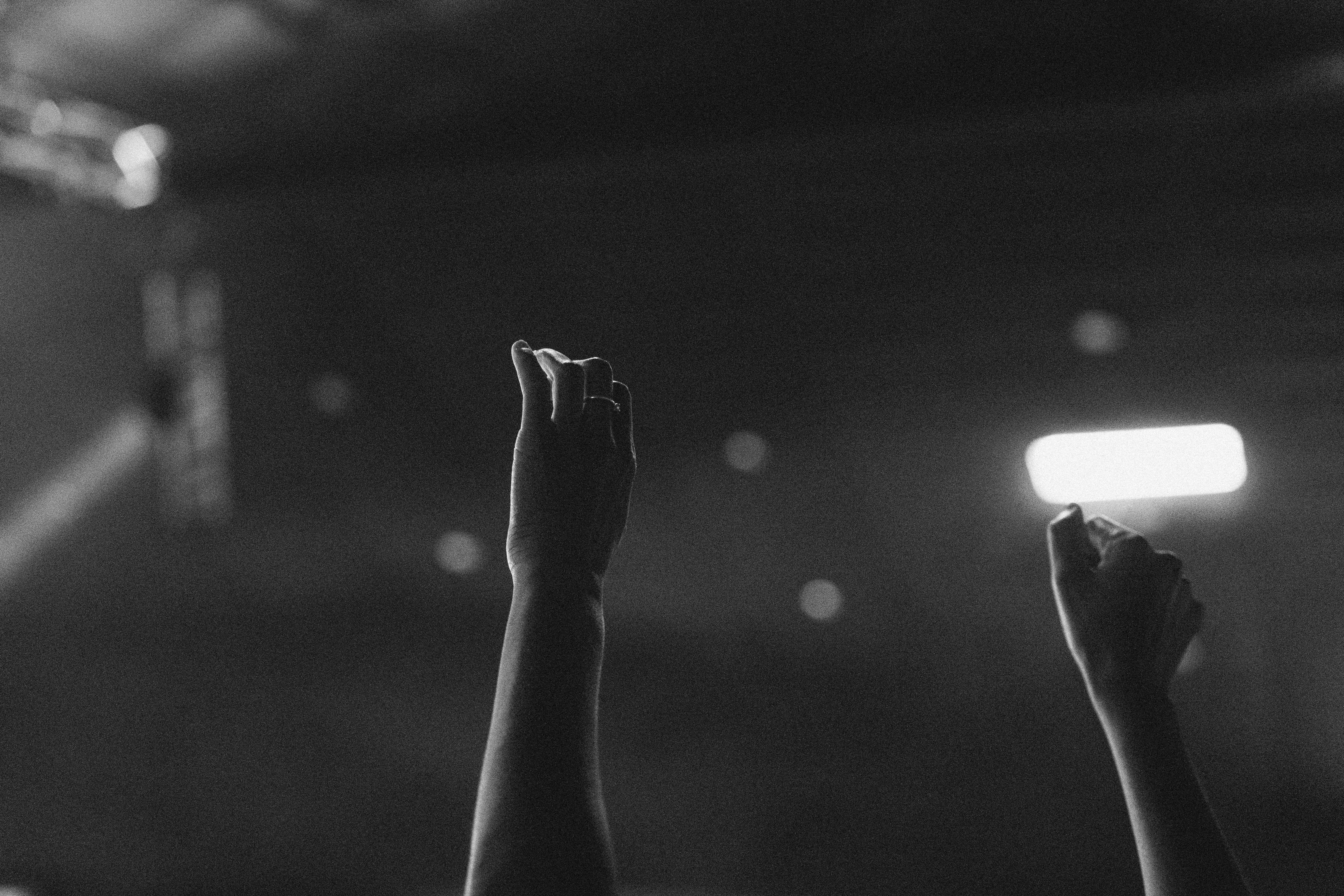 Hands raised during worship service