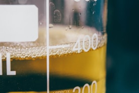a close up of a glass of beer