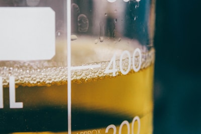 a close up of a glass of beer