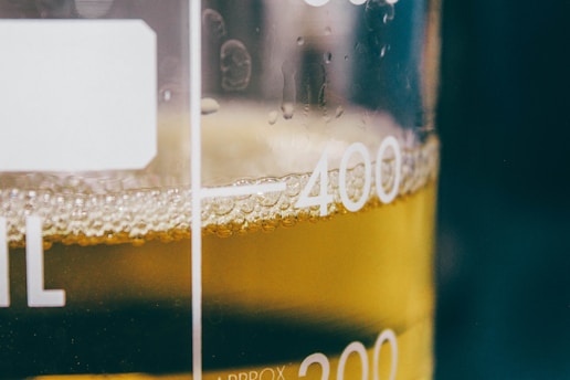 a close up of a glass of beer