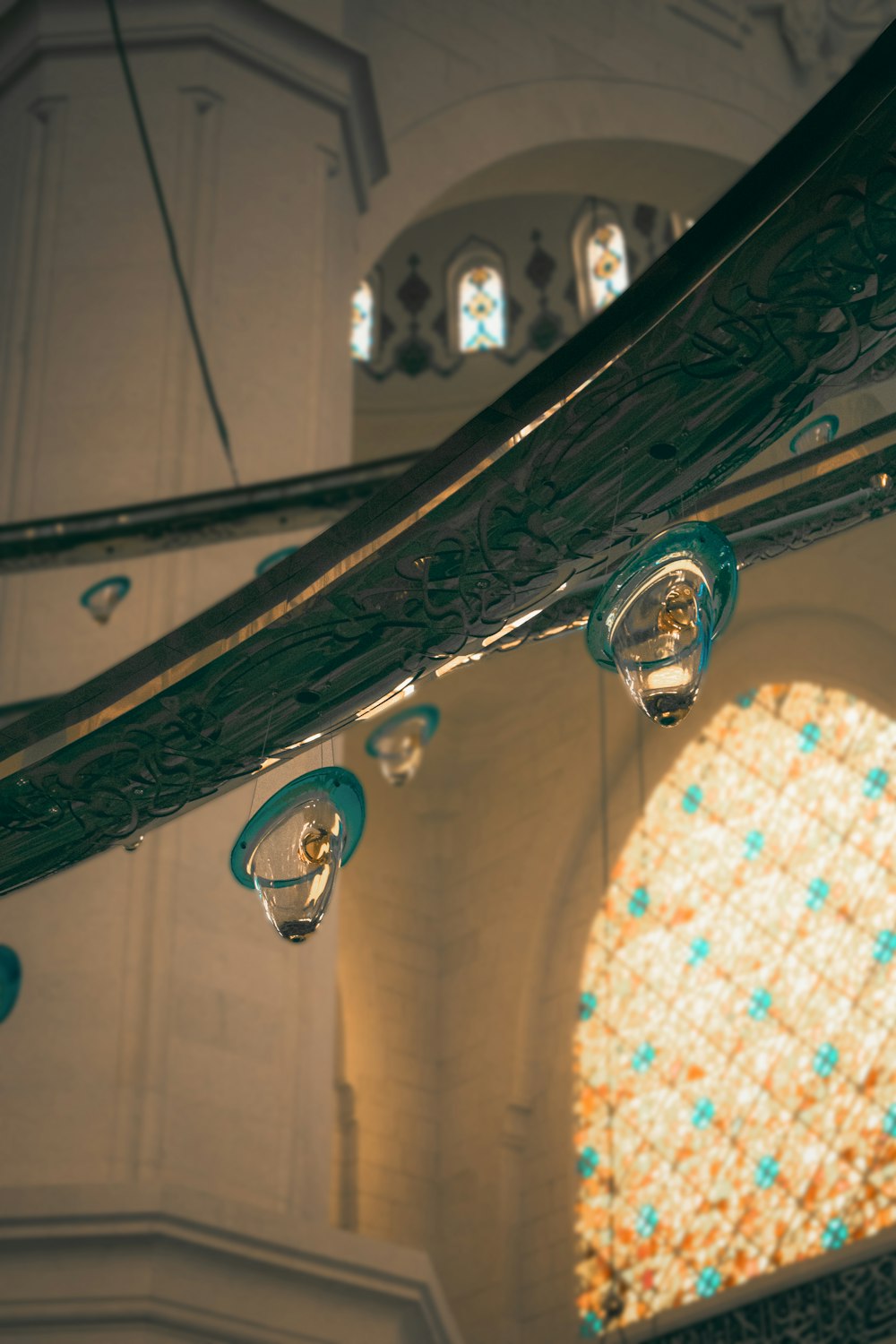 a chandelier hanging from the ceiling of a building