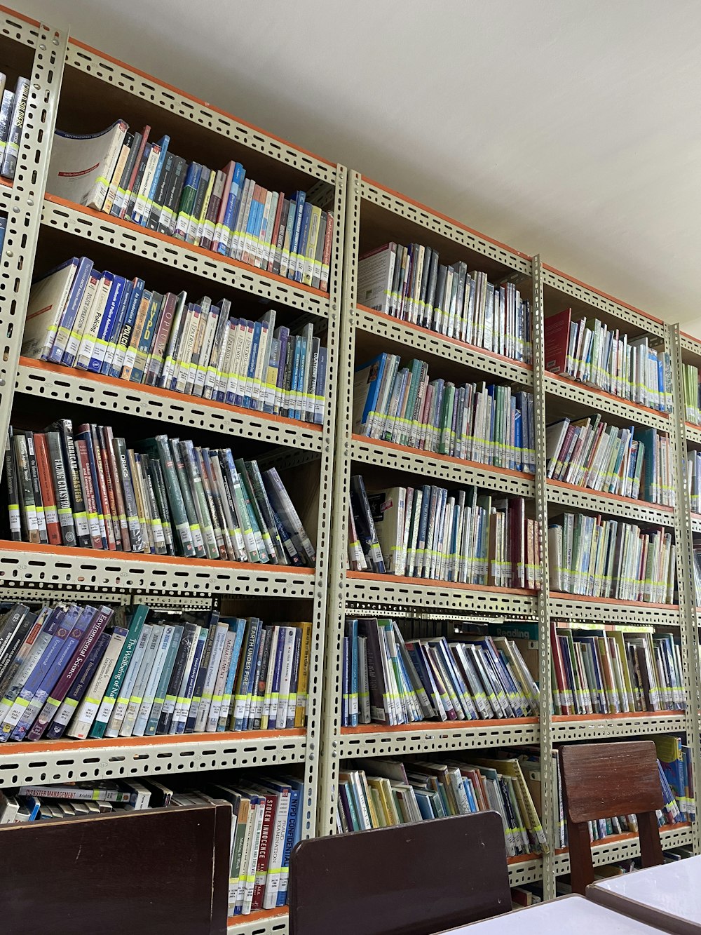 a library filled with lots of books on shelves