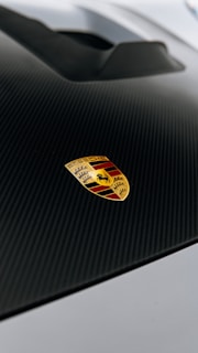 a close up of the emblem on a sports car