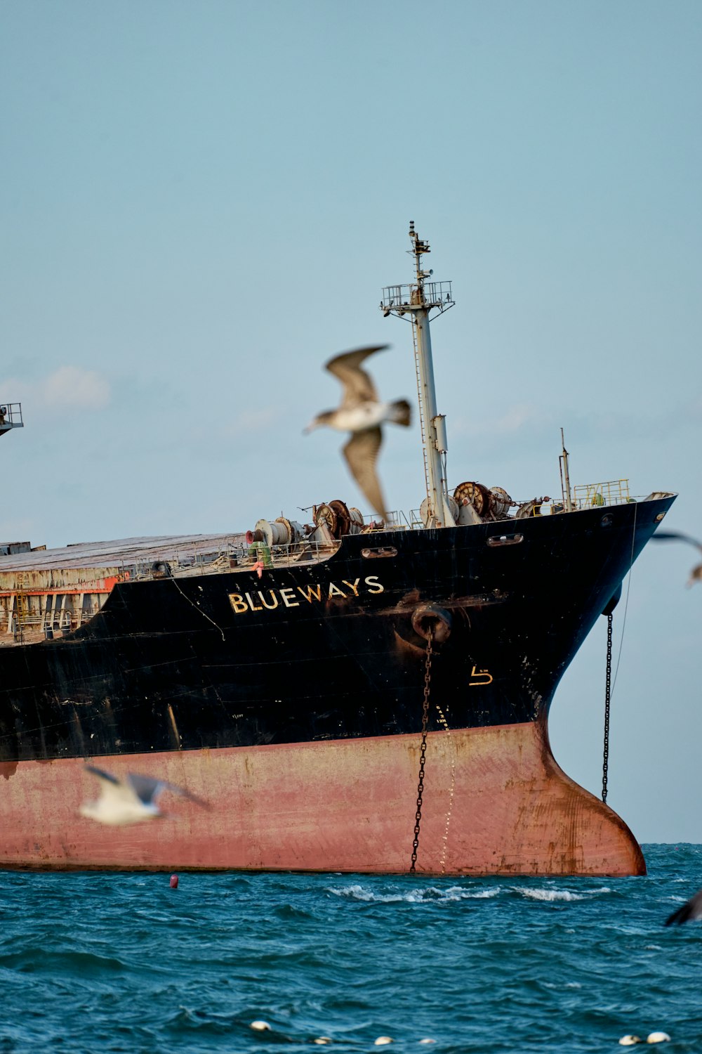 a large boat floating on top of a body of water