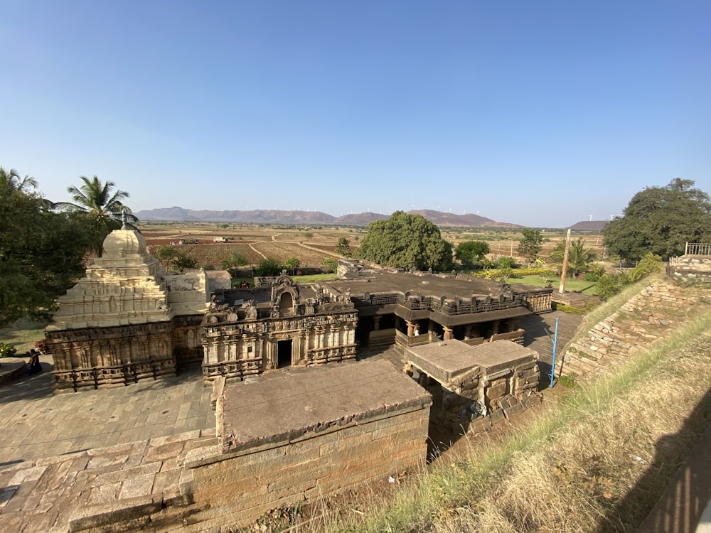 an aerial view of a temple in india