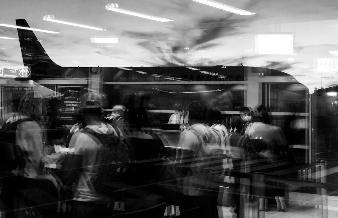 a black and white photo of a group of people, The feeling when a world is in crisis and you are waiting for the mighty t