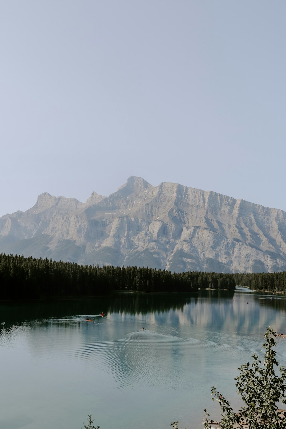 a lake with a mountain in the background