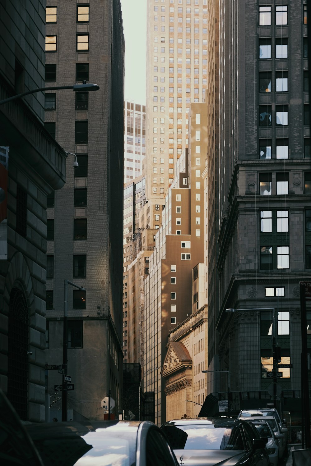 a city street filled with lots of tall buildings