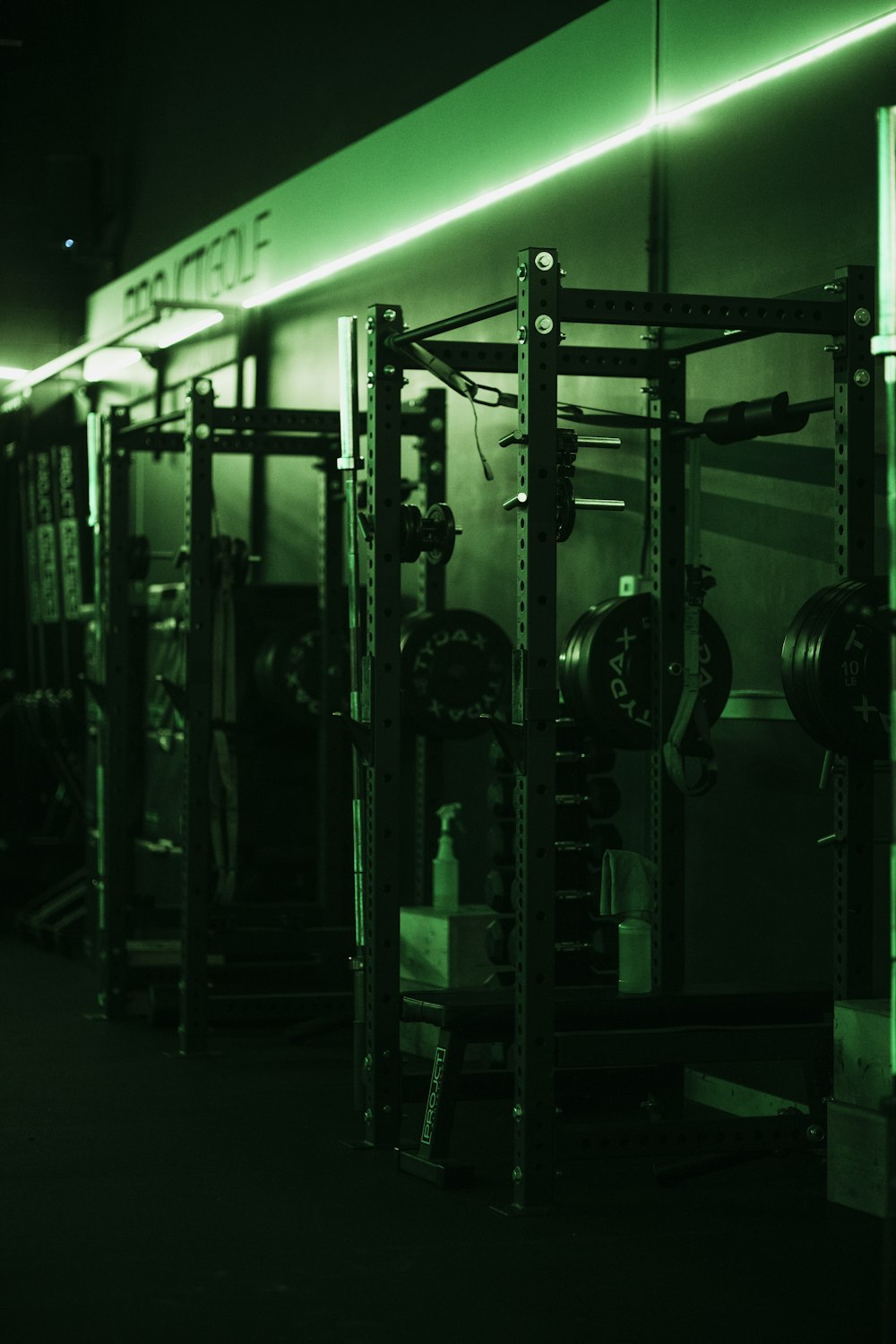 a gym with a green light on the side of it