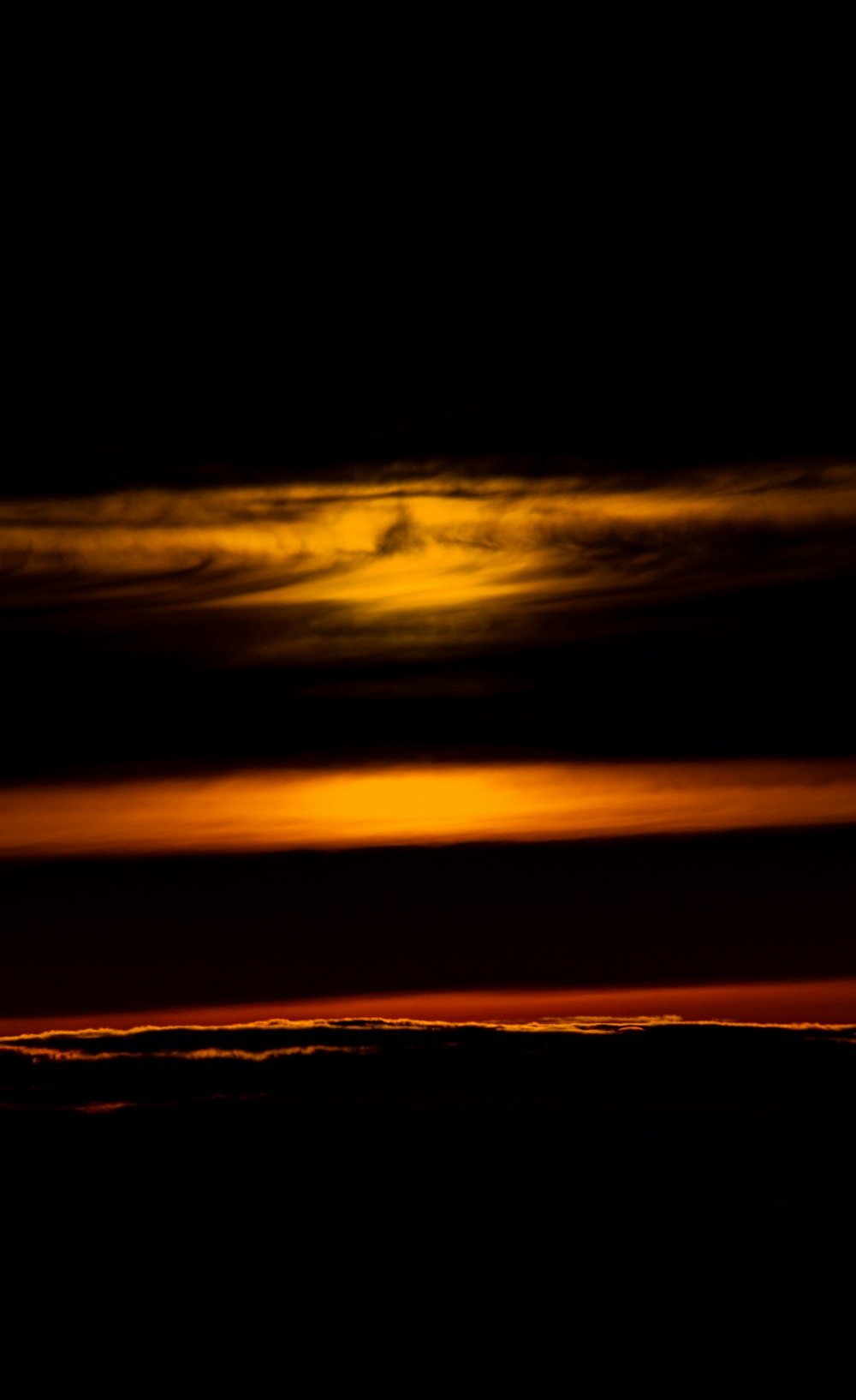 a plane flying in the sky at night