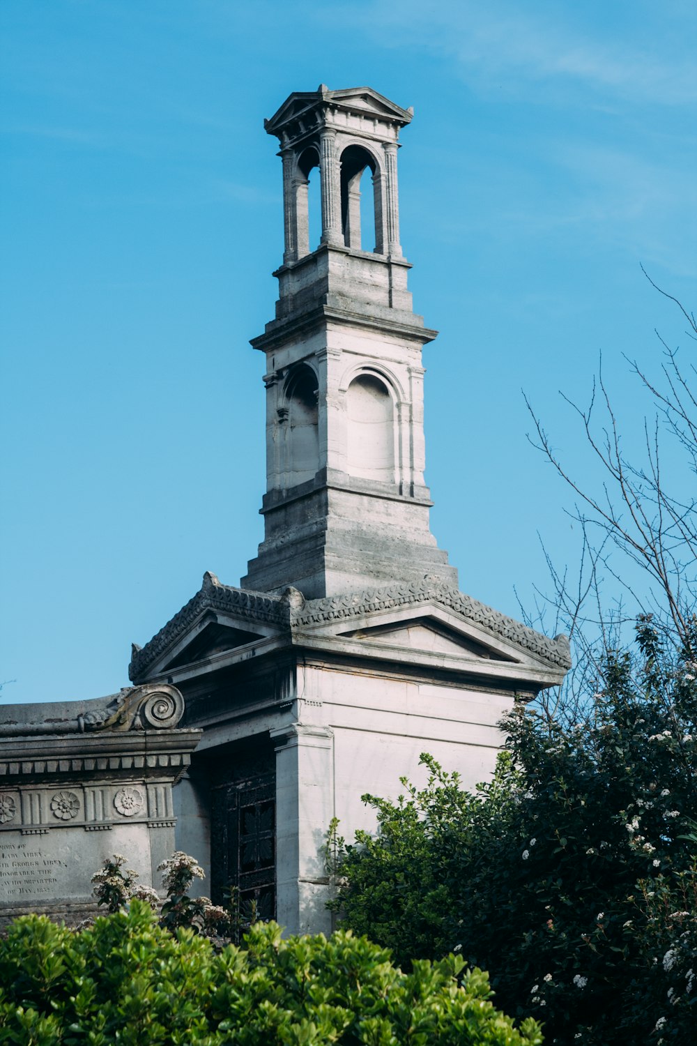 a tall tower with a clock on top of it