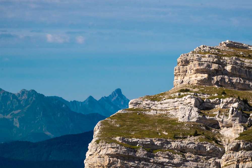 a large mountain with a very tall rock outcropping