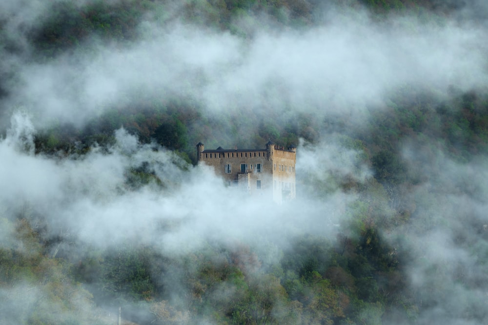 a castle in the middle of the clouds
