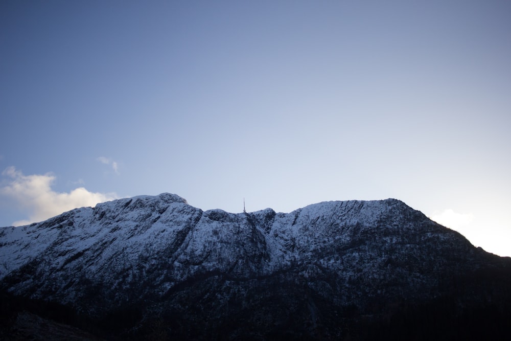 a view of a mountain with snow on it