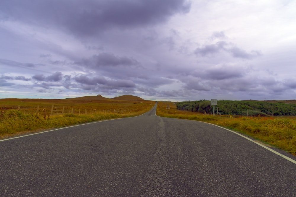 an empty road in the middle of nowhere