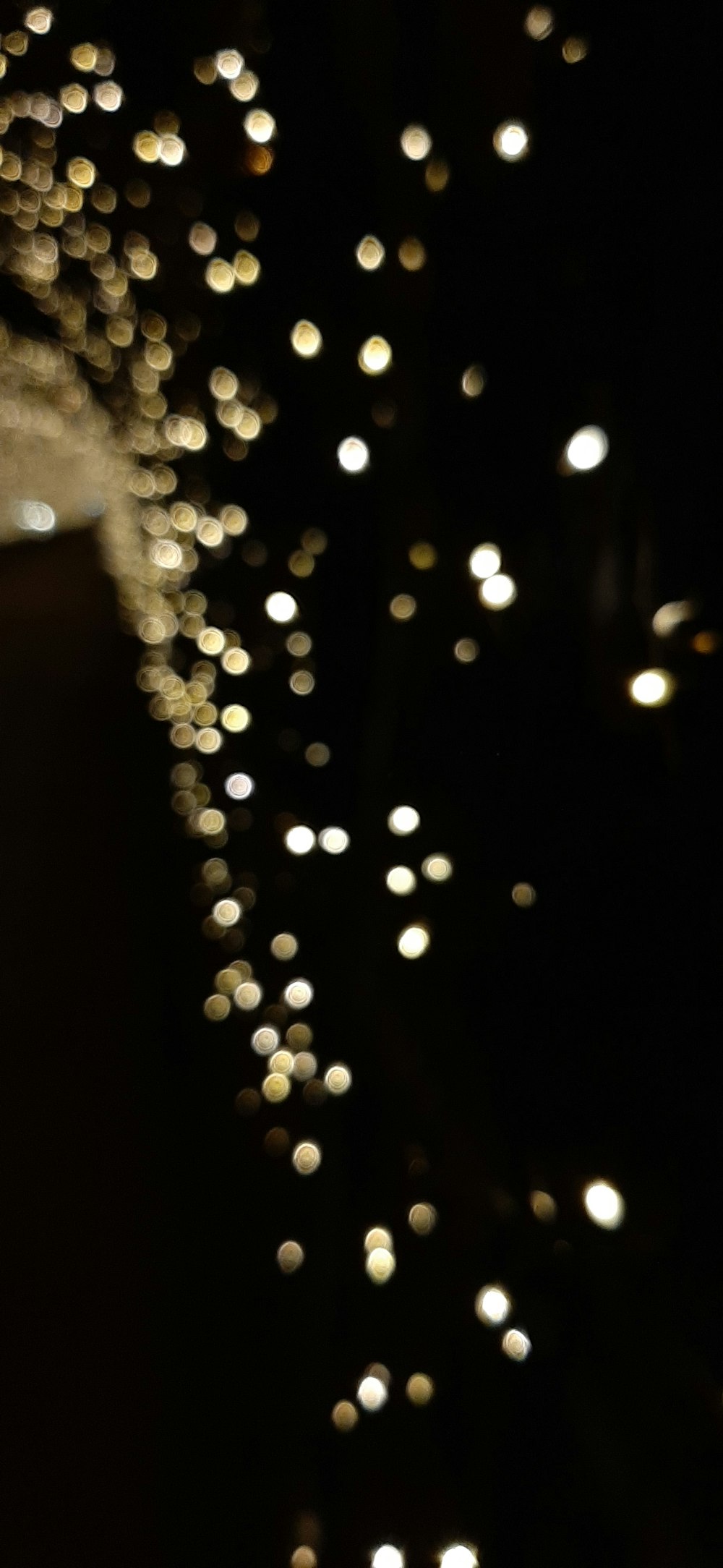 a blurry photo of lights in the dark