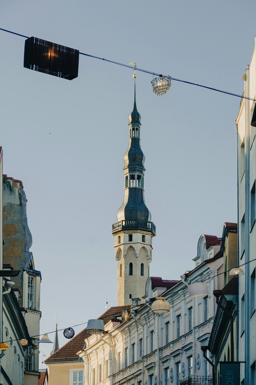 a street light hanging over a city street