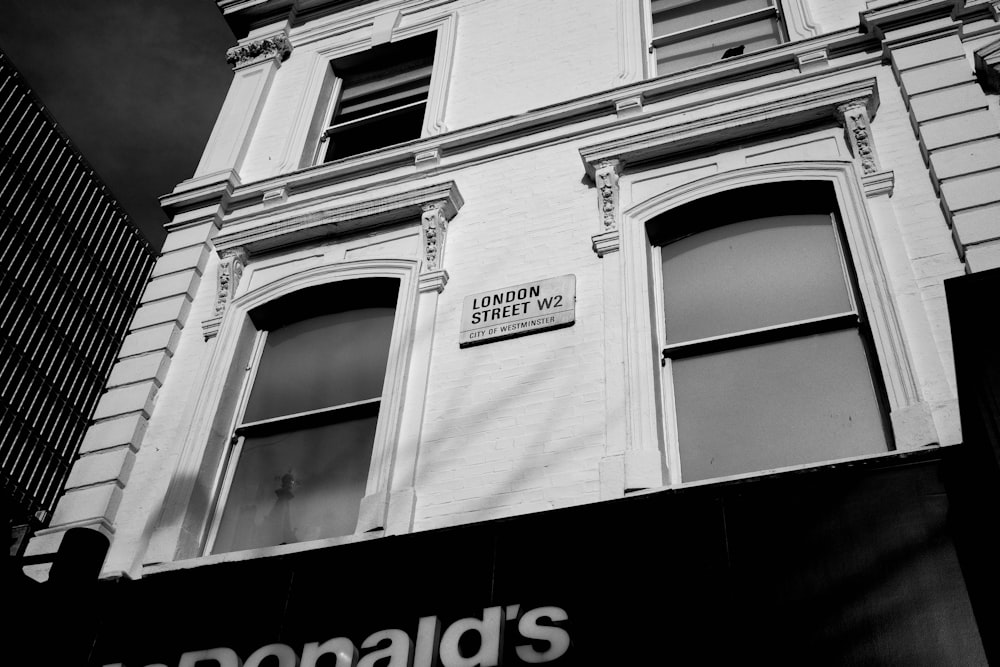 a black and white photo of a tall building