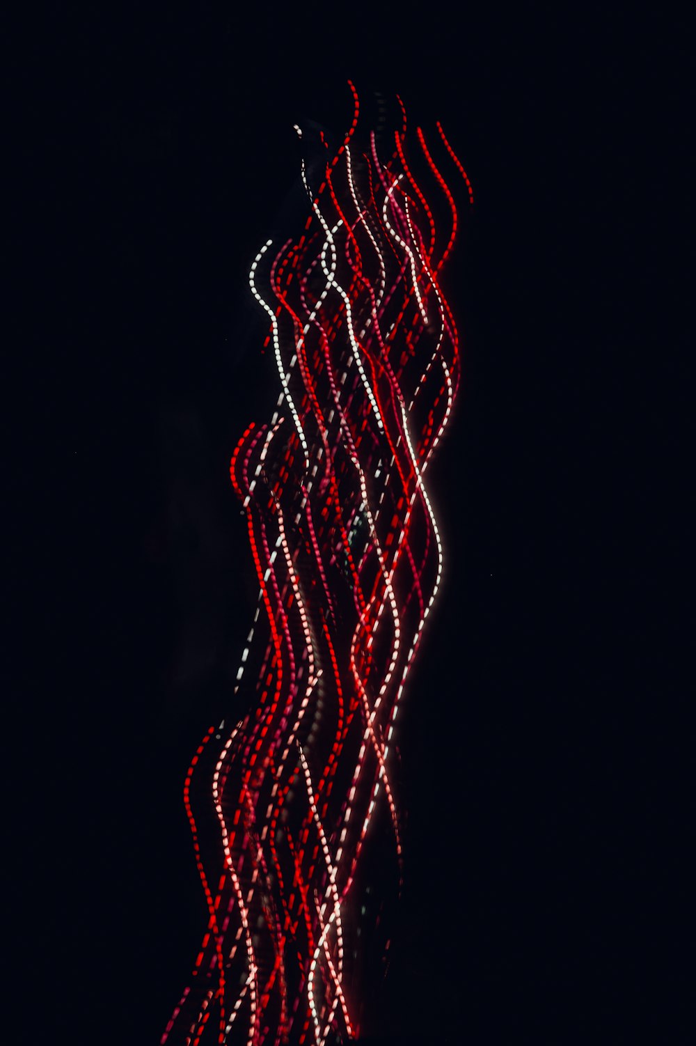 a long exposure of lights in the dark