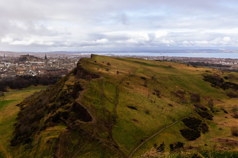 a view of a city from the top of a hill