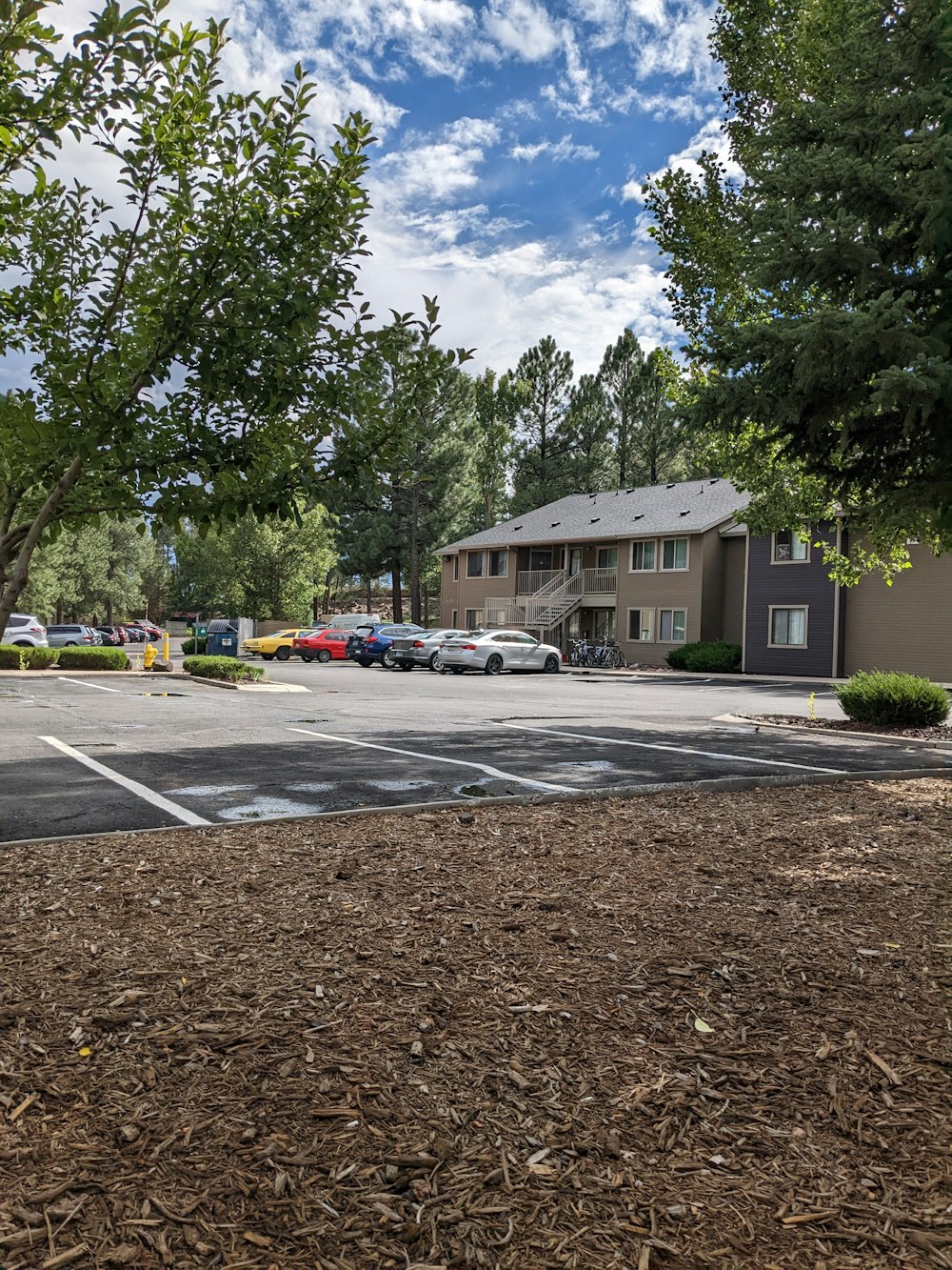 a parking lot with cars parked in it