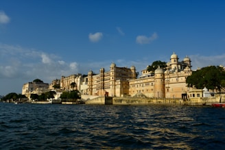 a large building sitting on top of a body of water
