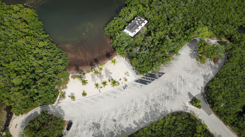 an aerial view of a walkway surrounded by trees