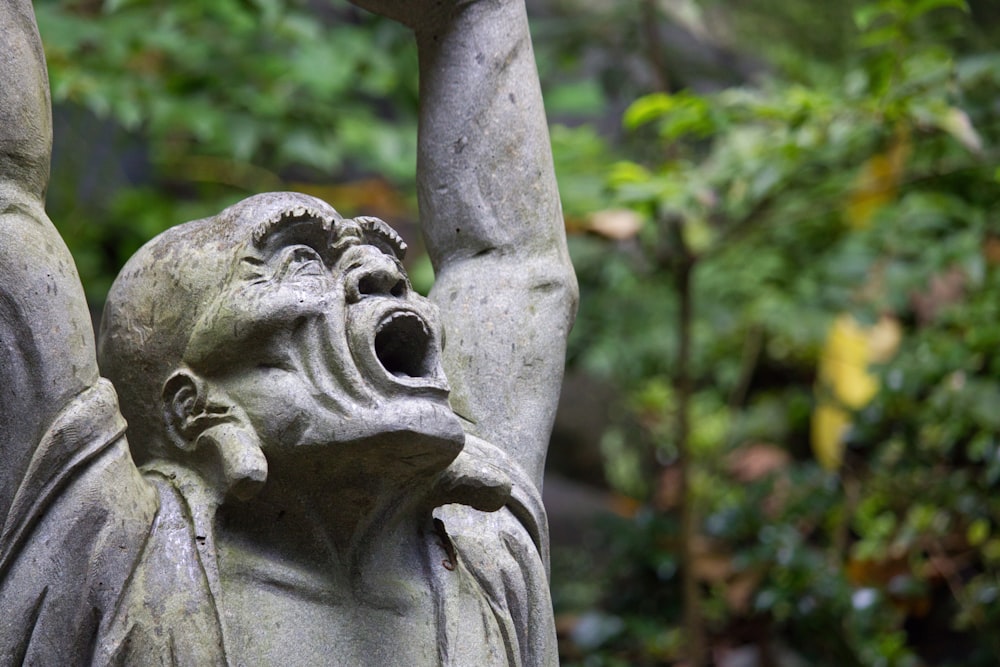a statue of a man with a surprised look on his face