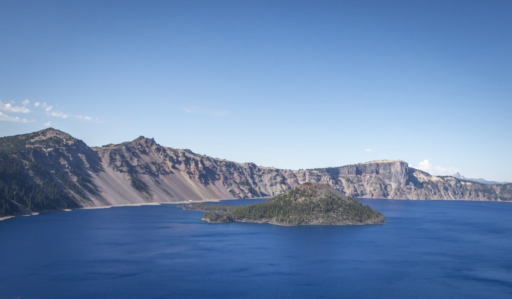 a large body of water surrounded by mountains