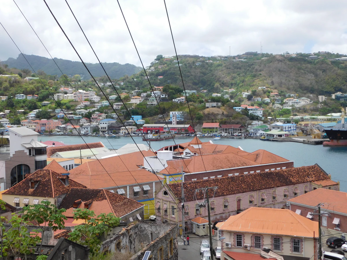 The Carenage and red-roofed streets of St George's climbing the hills around Grenada's harbour