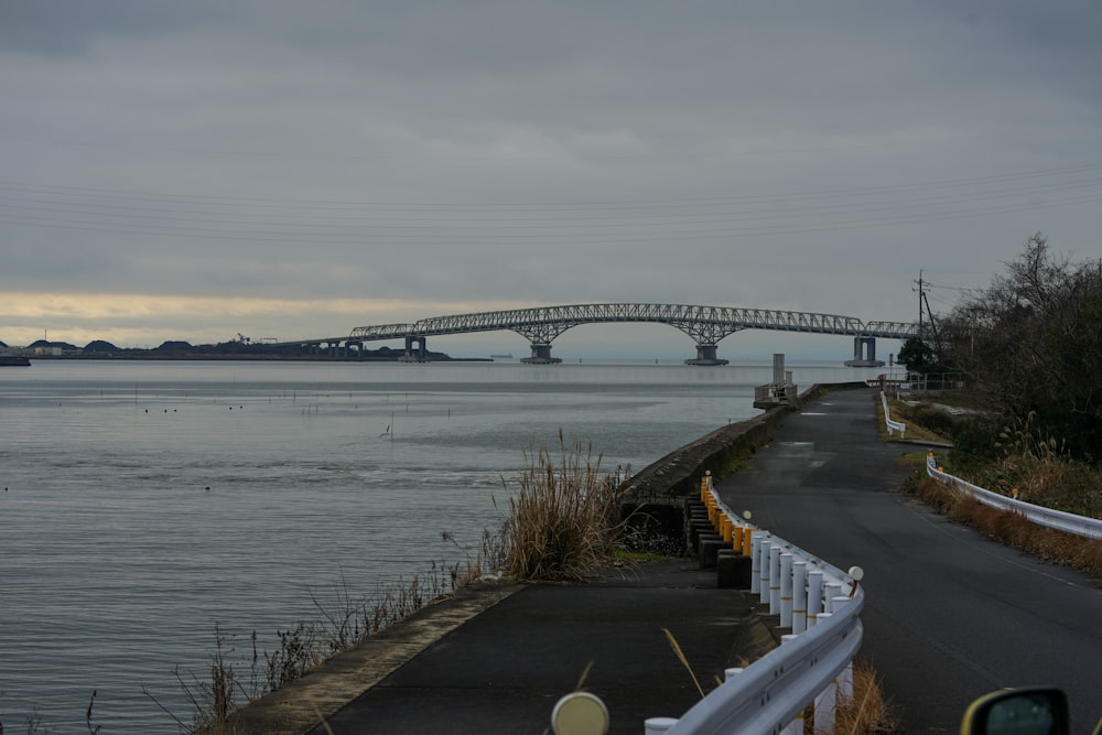 a view of a bridge over a body of water