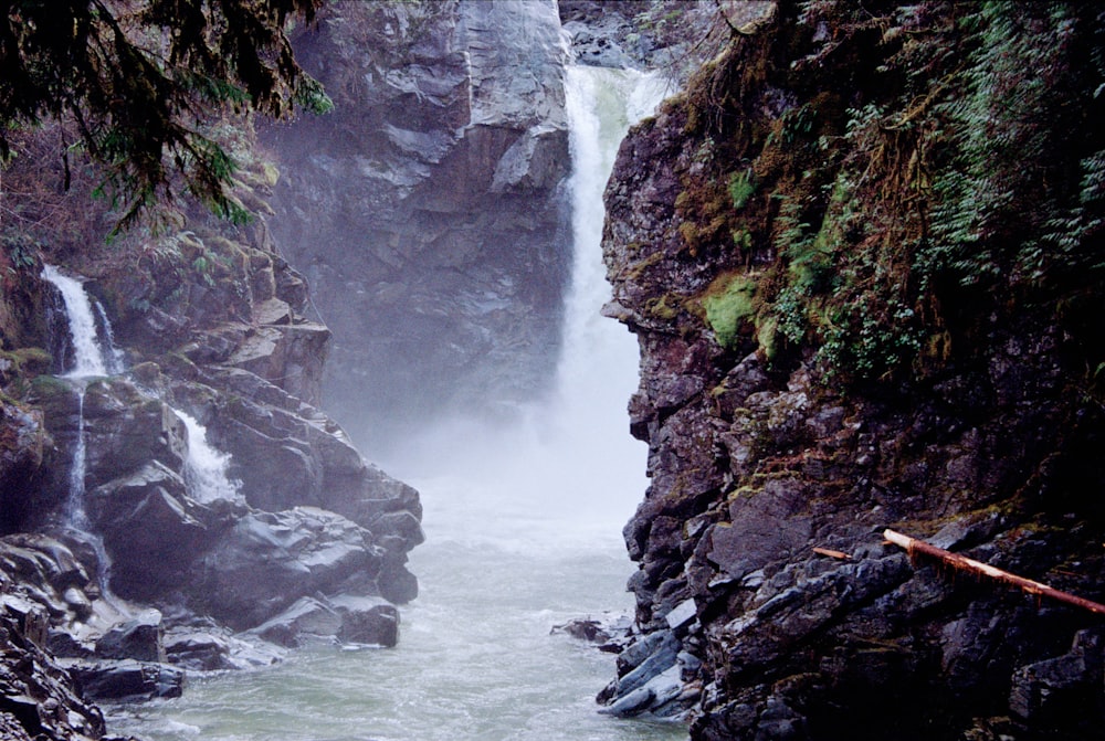 a waterfall with water coming out of it