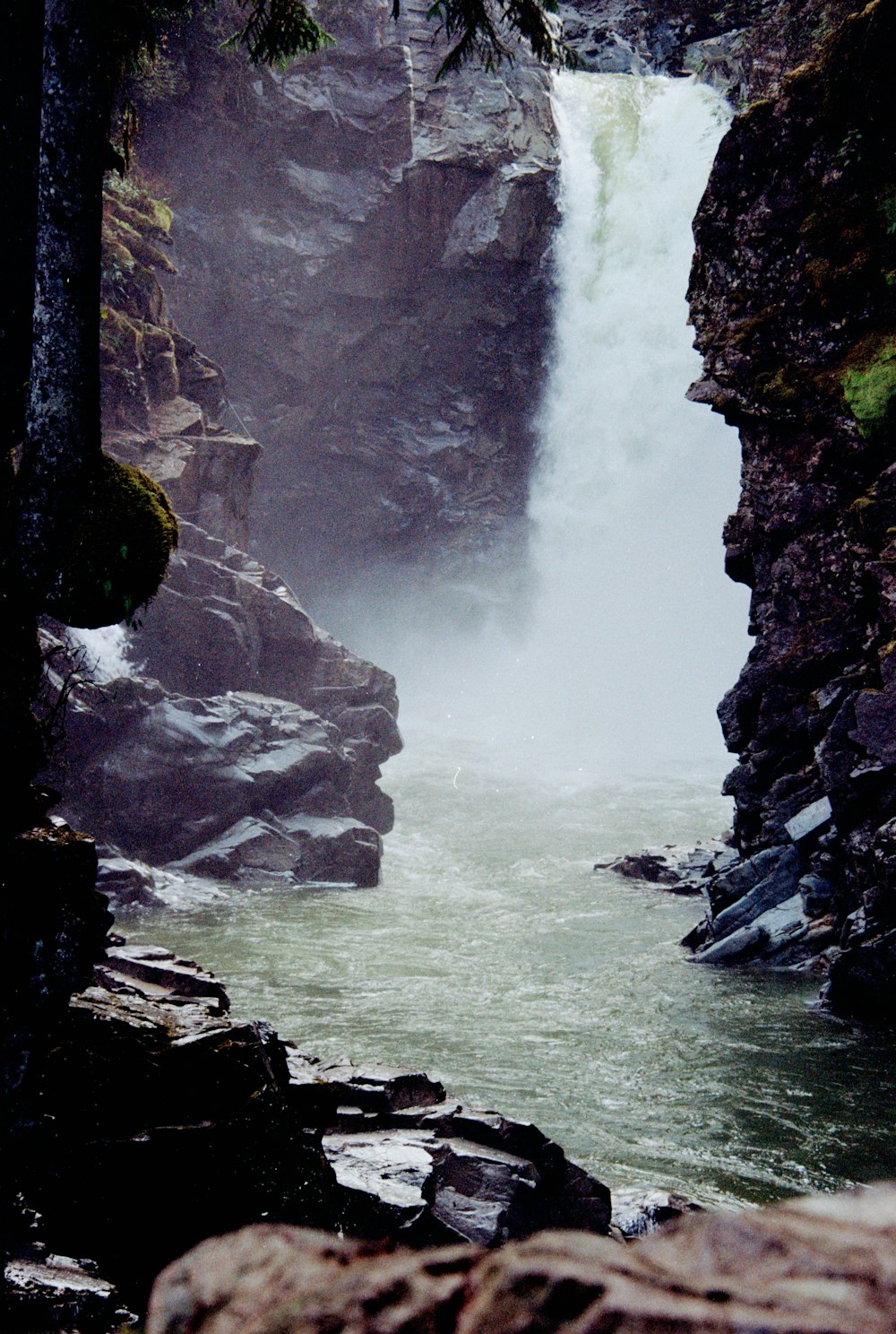 a waterfall with water coming out of it