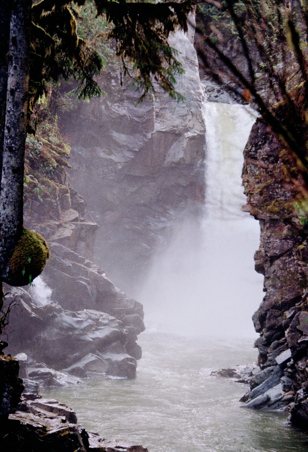 a waterfall with water coming out of it