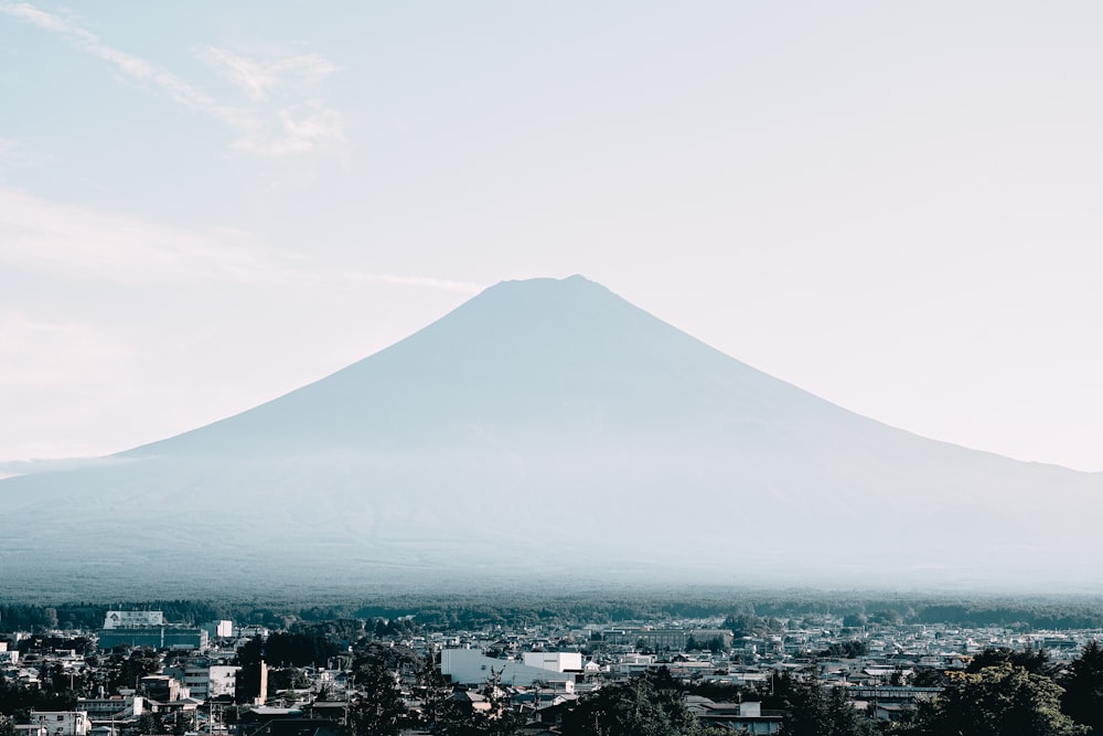 a view of a city with a mountain in the background