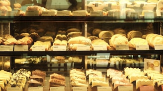 a display case filled with lots of different types of pastries