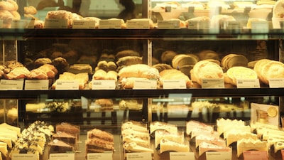 a display case filled with lots of different types of pastries