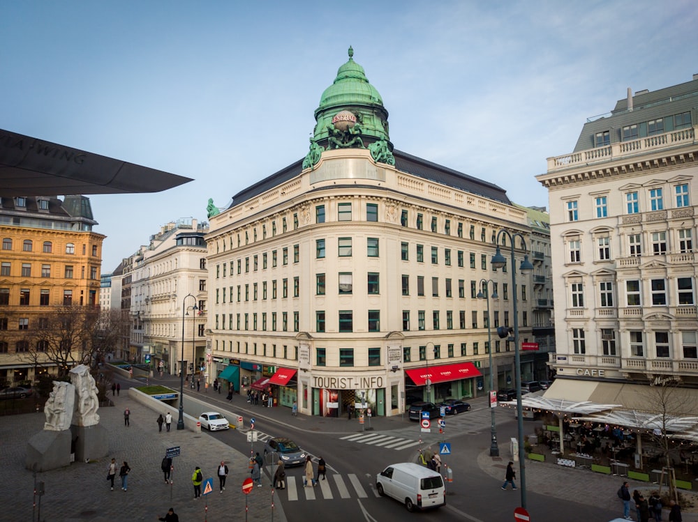 a large building with a green dome on top of it