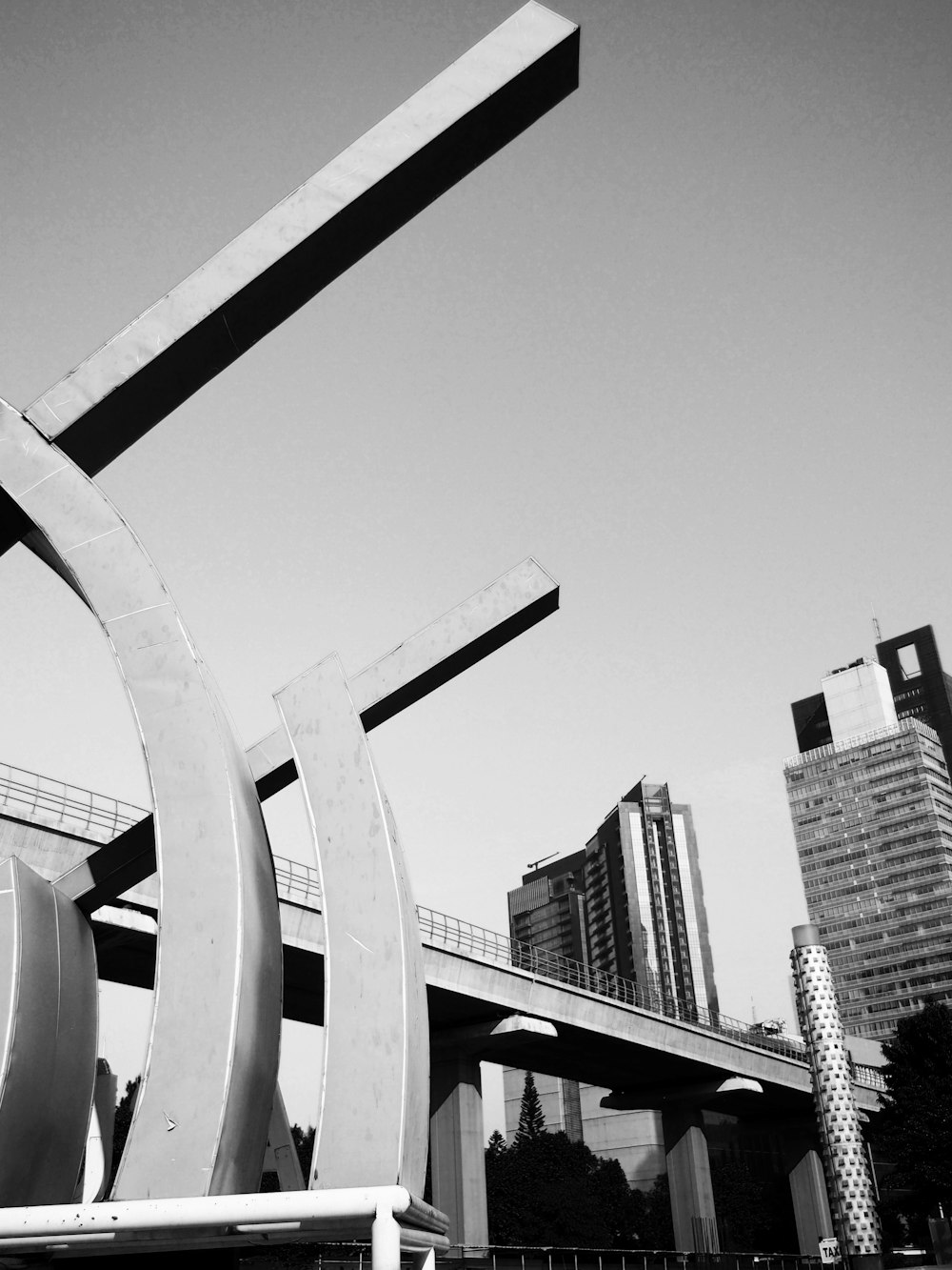 a black and white photo of a large sculpture