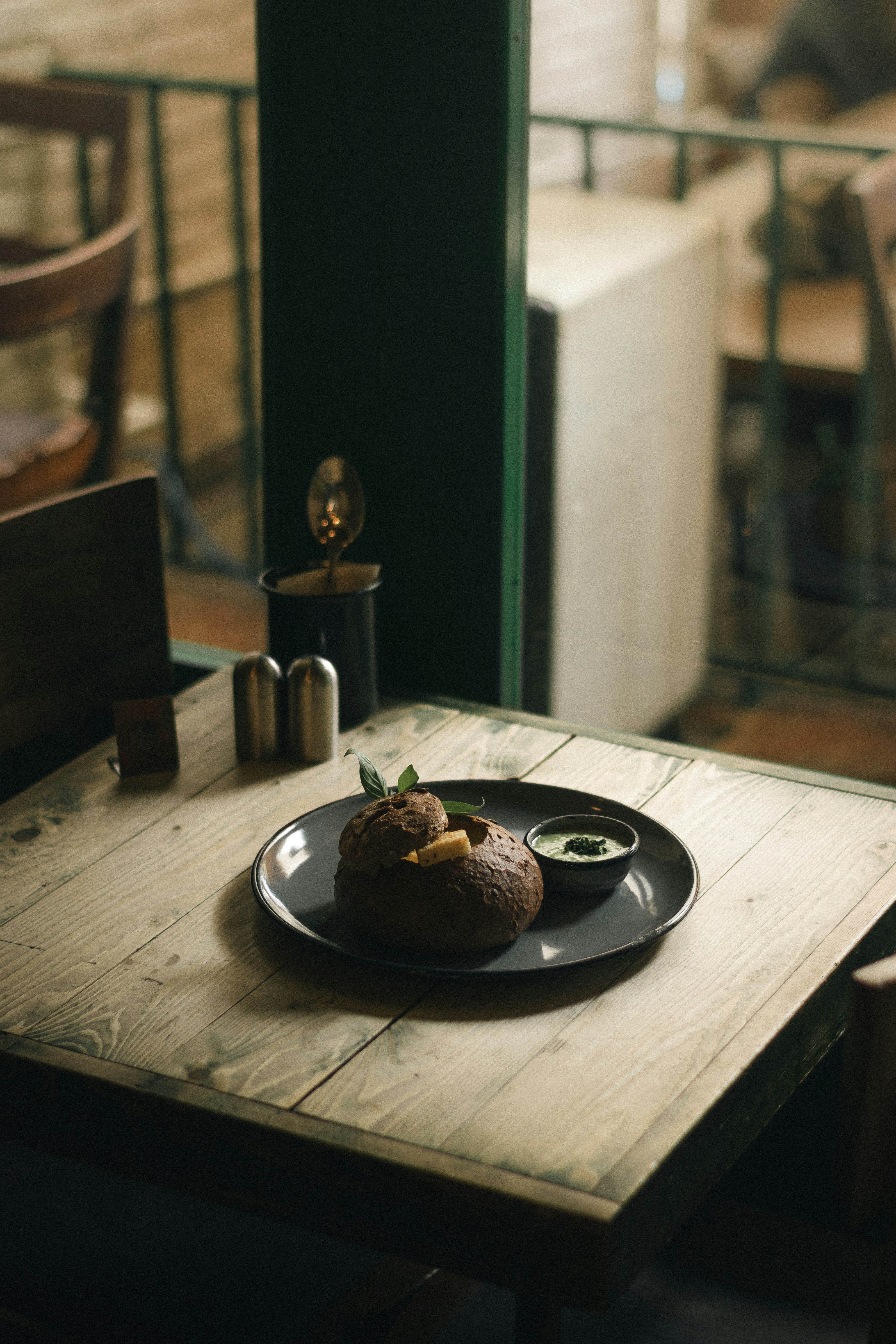 a plate of food on a wooden table