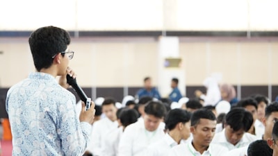 a man standing in front of a group of people
